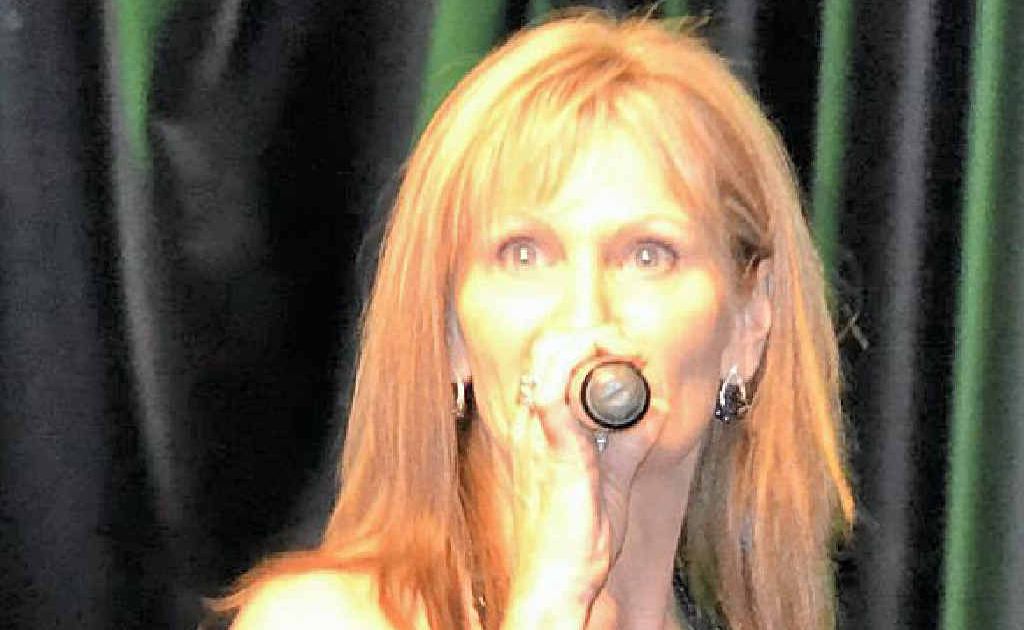 STAGE PRESENCE: Erin Hilton belts out a tune at the Queensland Champion of Champions festival. STAGE PRESENCE: Erin Hilton belts out a tune at the Queensland Champion of Champions festival.